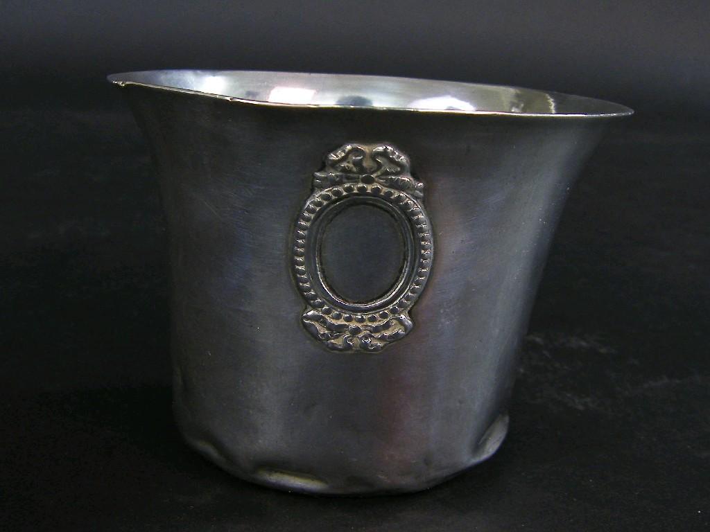 Appraisal: Continental white metal beaker with applied moulded blank cartouche with