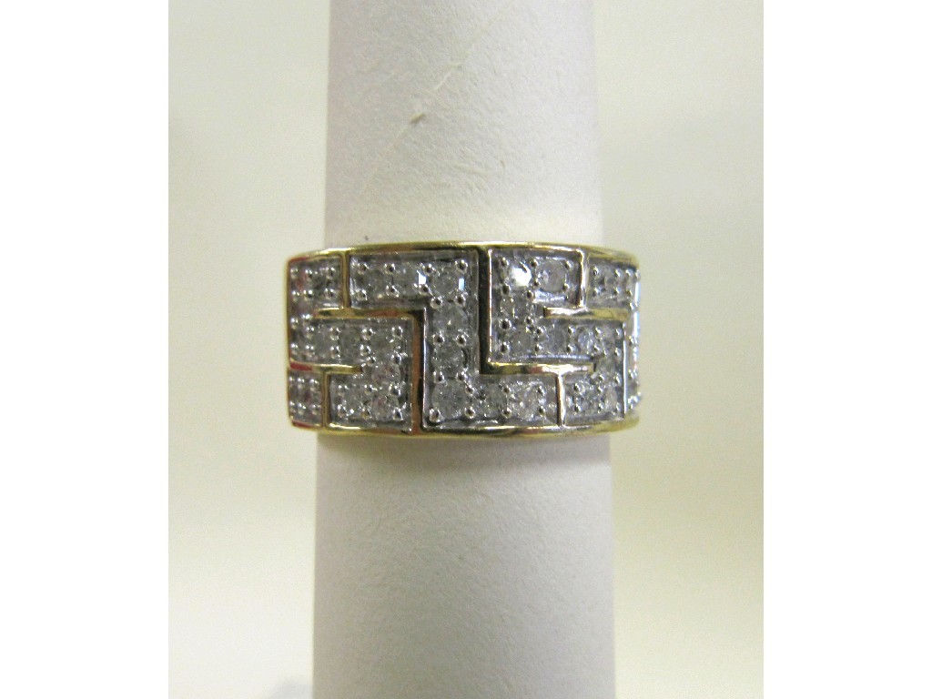 Appraisal: Nine carat gold diamond set band with brilliant cut diamonds