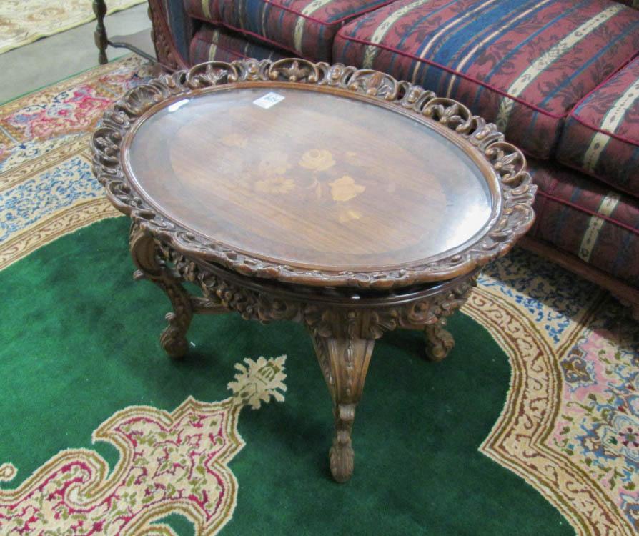 Appraisal: CARVED AND INLAID TEA TABLE American mid- th century having