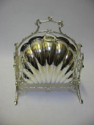 Appraisal: A VICTORIAN FOLDING BISCUIT BOX of shell form with rustic