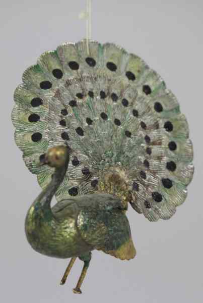 Appraisal: DRESDEN PEACOCK CHRISTMAS TREE ORNAMENT Germany iridescent green peacock trimmed