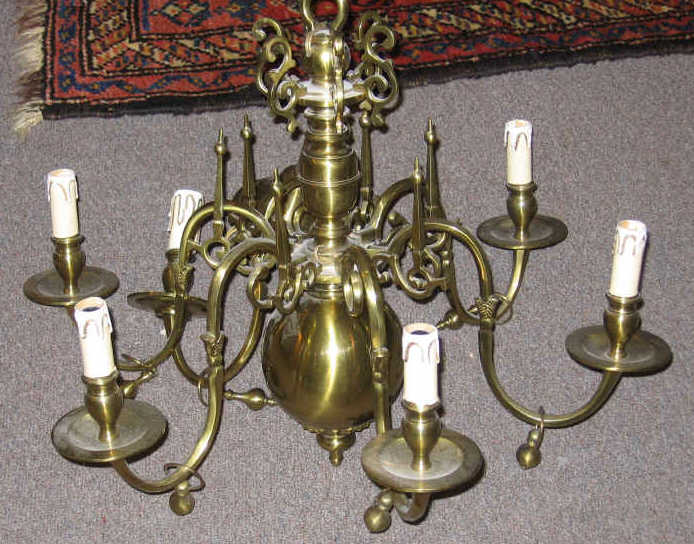 Appraisal: SOLID BRASS SIX LIGHT CHANDELIER Having a turned stem with