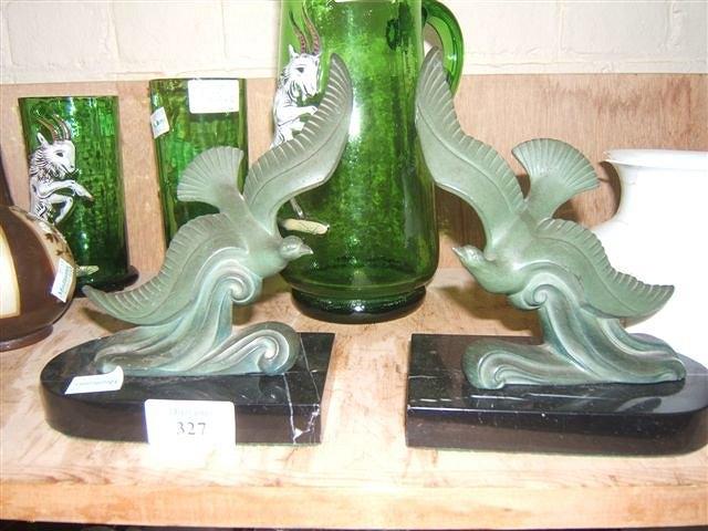 Appraisal: A pair of Art Deco marble and spelter bookends in