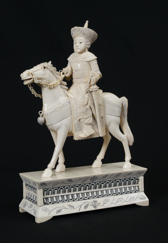 Appraisal: CARVED IVORY ROYAL FIGURE ON HORSEBACK Figure of a royal