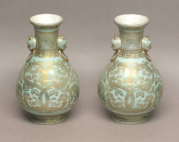 Appraisal: Two celadon glazed porcelain vases with gilt decoration Qianlong Marks