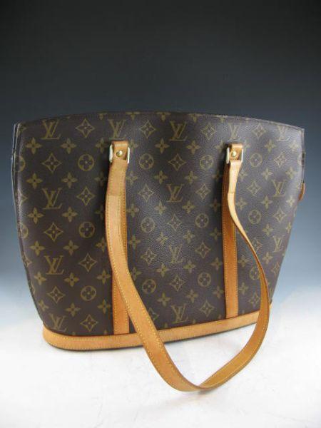 Appraisal: Louis Vuitton Monogram Babylone Bag with mellow patina double shoulder