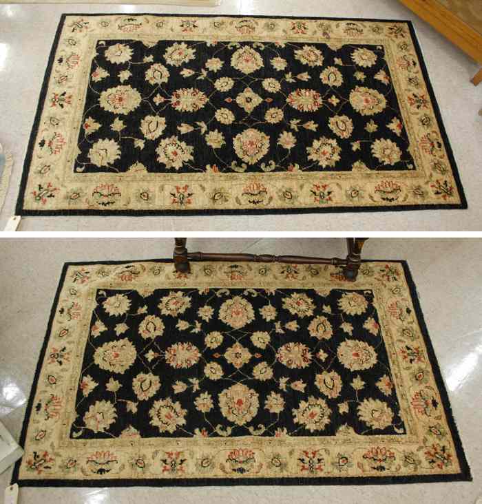 Appraisal: TWO MATCHING ORIENTAL AREA RUGS Pakistani-Persians matching floral designs on