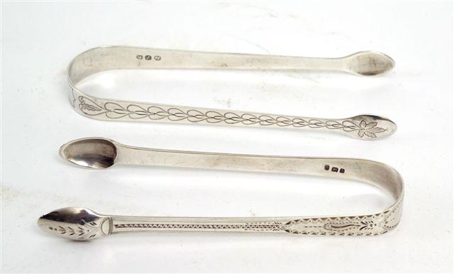 Appraisal: PAIR OF GEORGE III SILVER BRIGHT-CUT SUGAR TONGS PETER WILLIAM