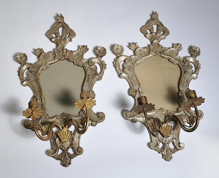 Appraisal: Pair of Italian Rococco style wall sconces with double brass