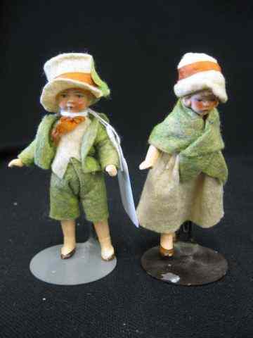 Appraisal: Pair of German Bisque Dolls boy girl in felt outfits