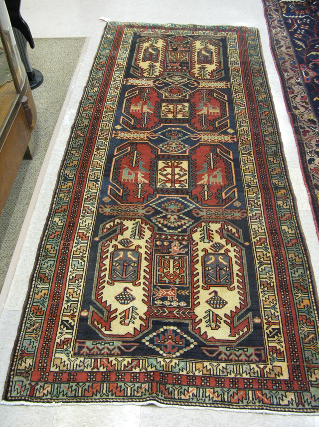 Appraisal: PERSIAN TRIBAL AREA RUG Caucasian design hand knotted ' x