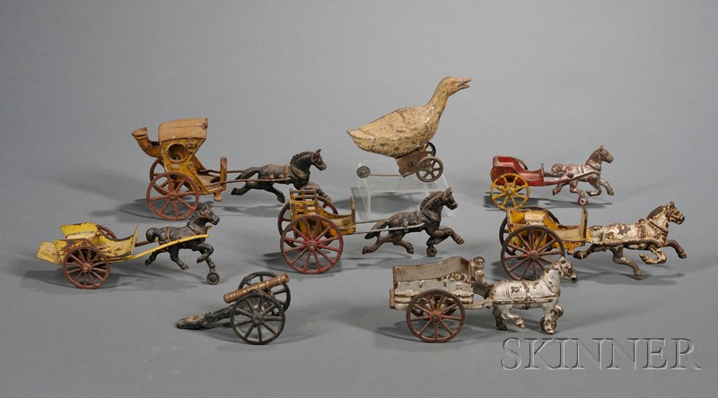 Appraisal: Eight Assorted Painted Cast Iron and Tin Toys America late