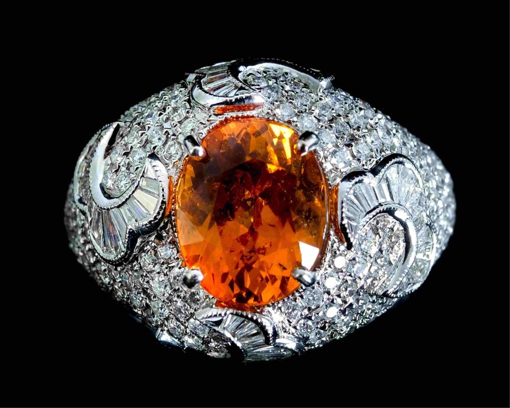 Appraisal: K WG ORANGE SPESSARTITE GARNET DIAMOND RING K white gold