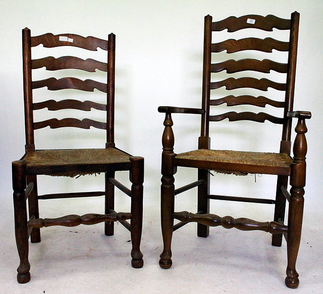 Appraisal: FIVE LANCASHIRE STYLE LADDERBACK RAFFIA STRUNG DINING CHAIRS