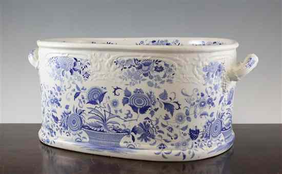 Appraisal: A Staffordshire Dresden pattern blue and white 'Opaque China' foot