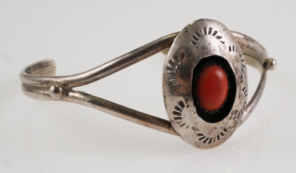 Appraisal: Native American sterling silver and red coral split band bracelet