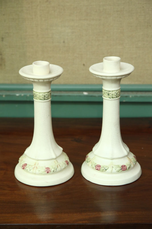 Appraisal: PAIR OF WELLER CANDLESTICKS In Roma pattern with impressed signatures