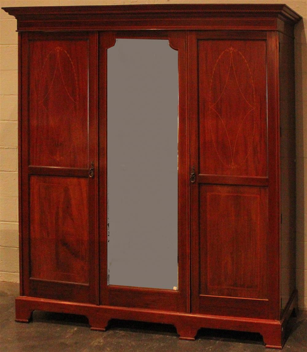 Appraisal: EDWARDIAN INLAID TRIPLE DOOR ARMOIRE ca having a molded cornice