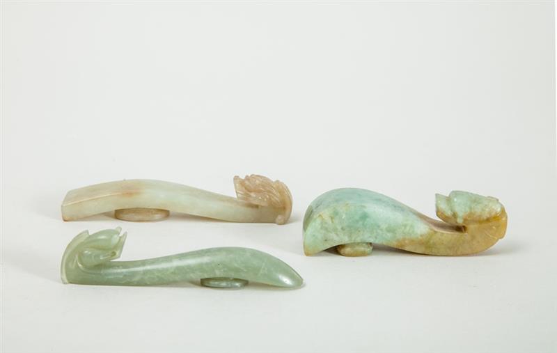 Appraisal: GROUP OF THREE CARVED JADE BELT HOOKS Each with dragon