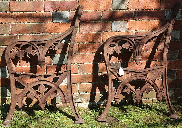 Appraisal: A PAIR OF ANTIQUE CAST IRON BENCH ENDS with acanthus