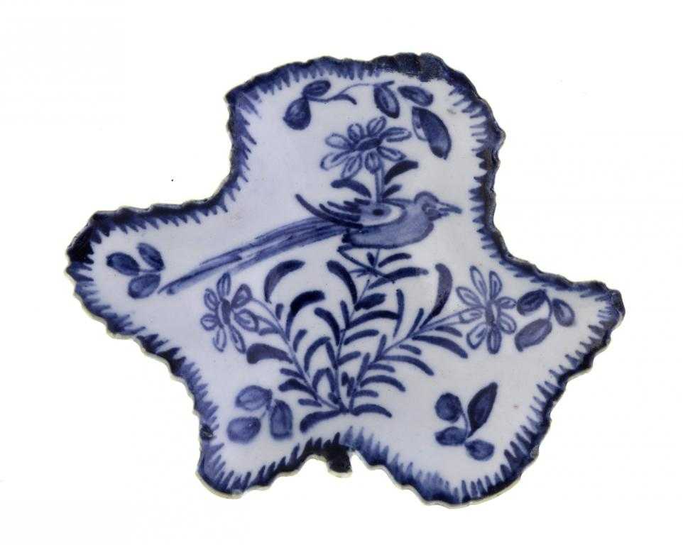 Appraisal: A BOW PICKLE DISH of vine leaf shape freely painted