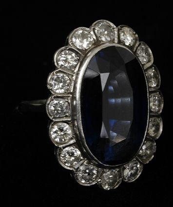 Appraisal: SAPPHIRE AND DIAMOND COCKTAIL RING Oval approx x in size