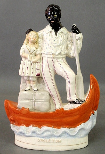 Appraisal: Staffordshire figure of Uncle Tom and Eva in a boat