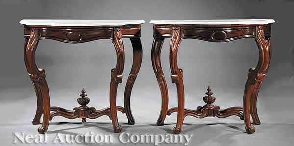 Appraisal: A Pair of American Rococo Carved Walnut Console Tables mid-