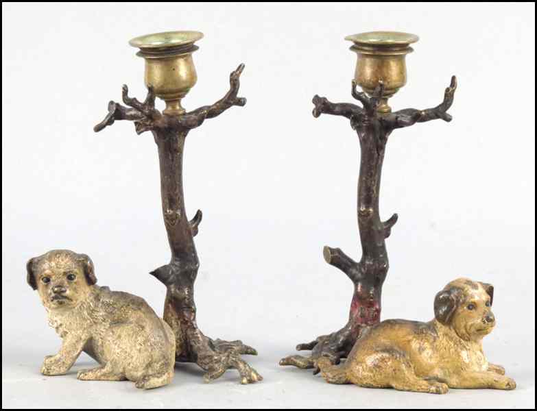 Appraisal: PAIR OF CONTINENTAL COLD PAINTED BRONZE CANDLESTICKS Depicting a seated