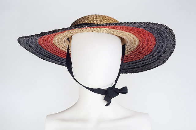 Appraisal: Two mid th century straw hats the first with blue