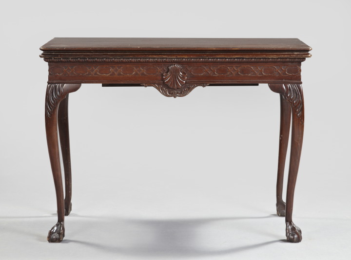 Appraisal: George III-Style Mahogany Dining Table the rectangular molded top lifting