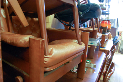 Appraisal: PAIR OF BROWN VINYL UPHOLSTERED ARM CHAIRS