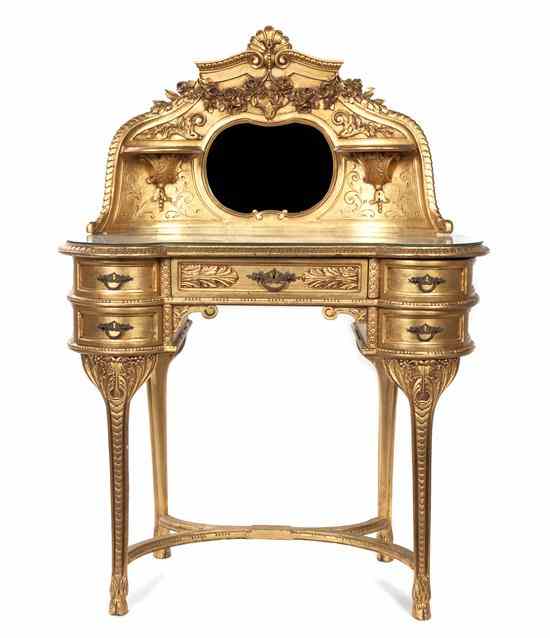 Appraisal: A Neoclassical Giltwood Dressing Table having a shell and foliate