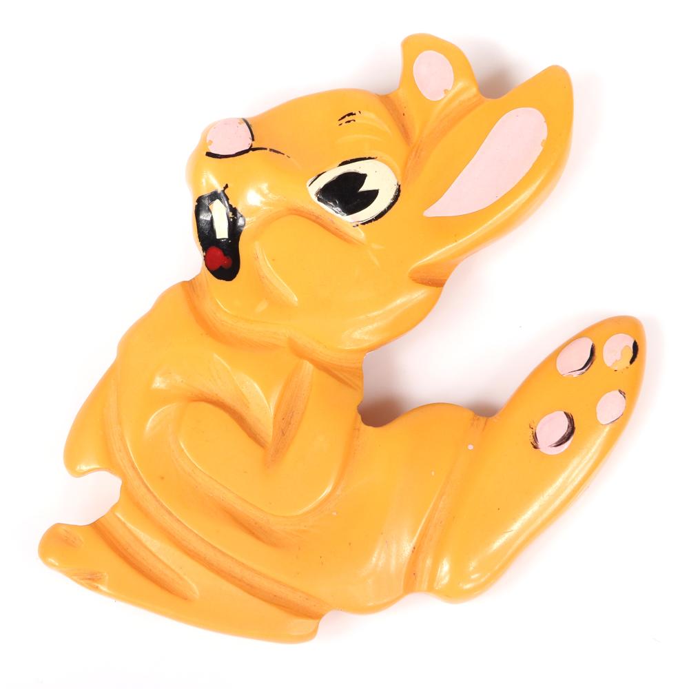 Appraisal: VINTAGE CARVED BAKELITE THUMPER FROM DISNEY''S BAMBI OVERDYED BUTTERSCOTCH FIGURAL