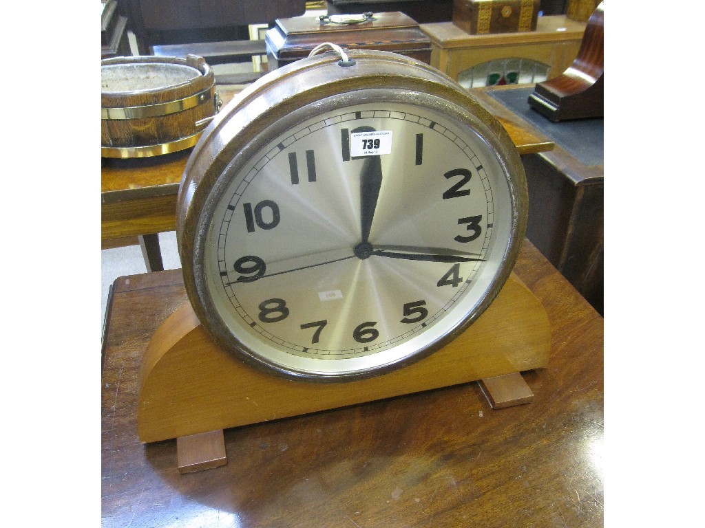 Appraisal: Electric clock on stand