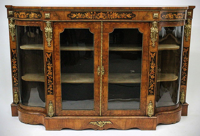 Appraisal: A VICTORIAN WALNUT AND MARQUETRY INLAID CREDENZA with ormolu mounts