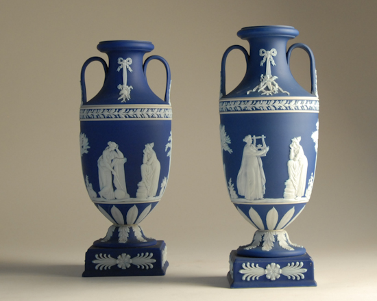 Appraisal: A Pair of E th C Wedgwood Jasperware Urns dark