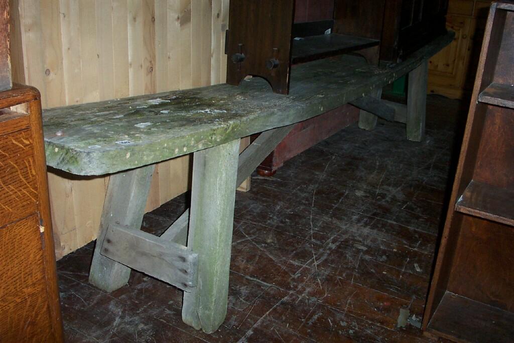 Appraisal: A Georgian oak bench on square cut supports approximately feet