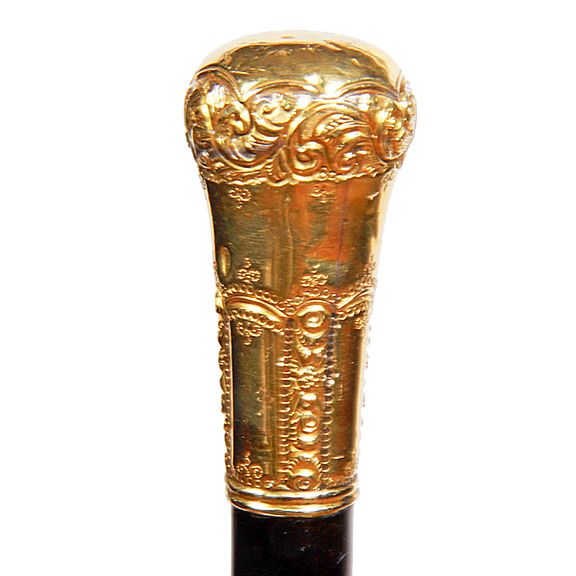 Appraisal: Gold Dress Cane Ca - A beautiful bright gold-filled handle