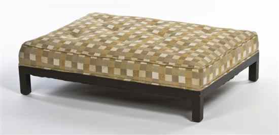 Appraisal: A Modern Upholstered Ottoman the button tufted top raised on