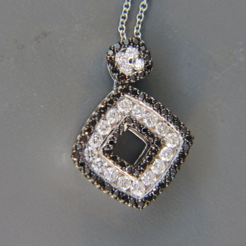 Appraisal: Diamond Pendant round white black diamonds totaling carat on chain