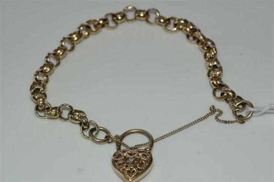 Appraisal: A FANCY LINK BRACELET WITH A DIAMOND SET HEART LOCKET