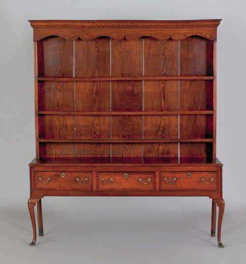 Appraisal: Welsh oak dresser ca with an open shelf top resting