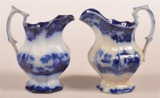 Appraisal: Two Flow Blue Ironstone China Cream Pitchers Two Flow Blue