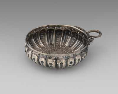 Appraisal: A Spanish Silver Porringer With deeply hand chased relief designs