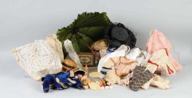 Appraisal: Large Bin of Doll Clothing Accessories Description Includes dresses wigs