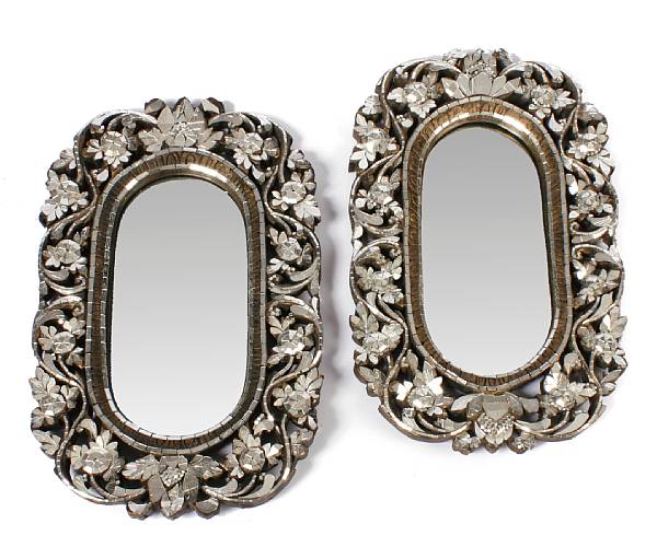 Appraisal: A pair of Venetian style mirror height in width in