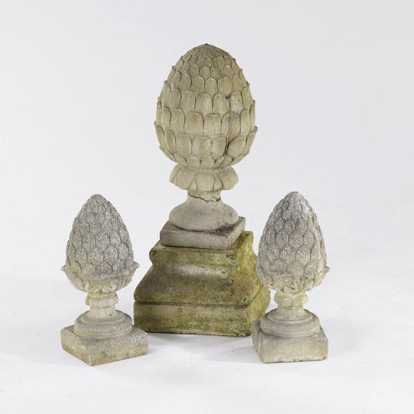 Appraisal: GARDEN STATUARY Large pineapple finial on base together with two