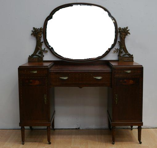 Appraisal: An early th century walnut mirror back sideboard and matching