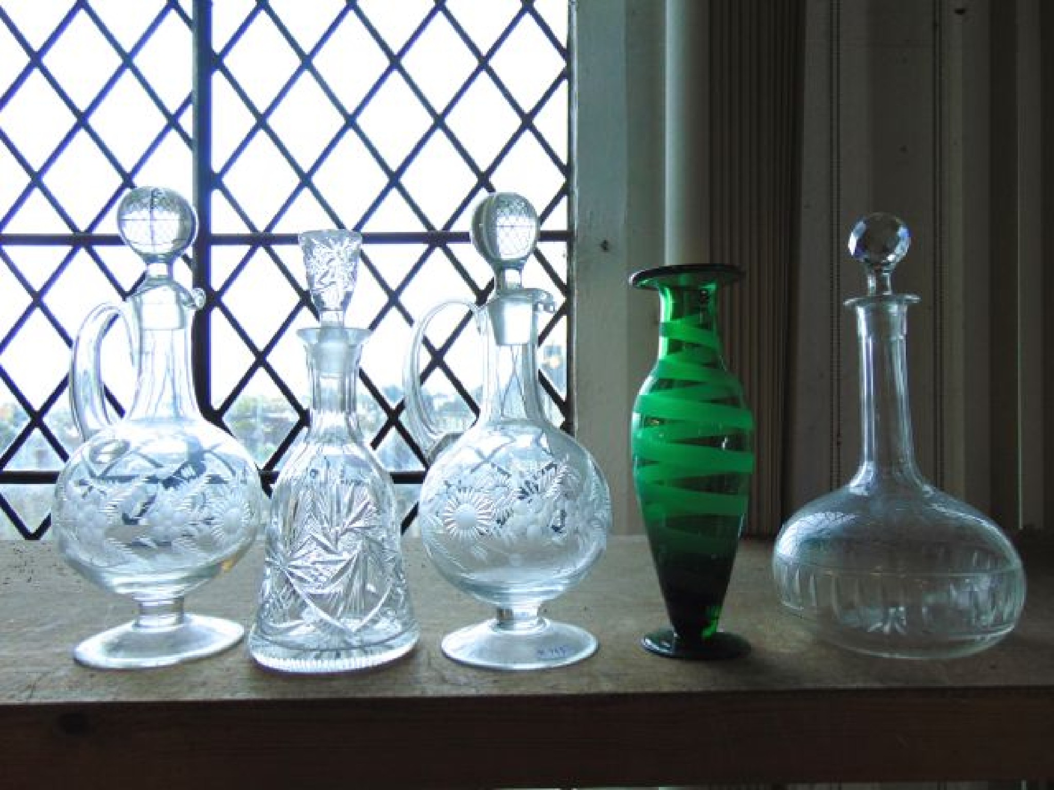 Appraisal: A clear cut glass decanter of shaft and globe form